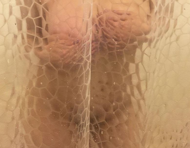 Big tits celeb babe Maitland Ward flaunting her huge bouncy tits in the shower after finishing her work out