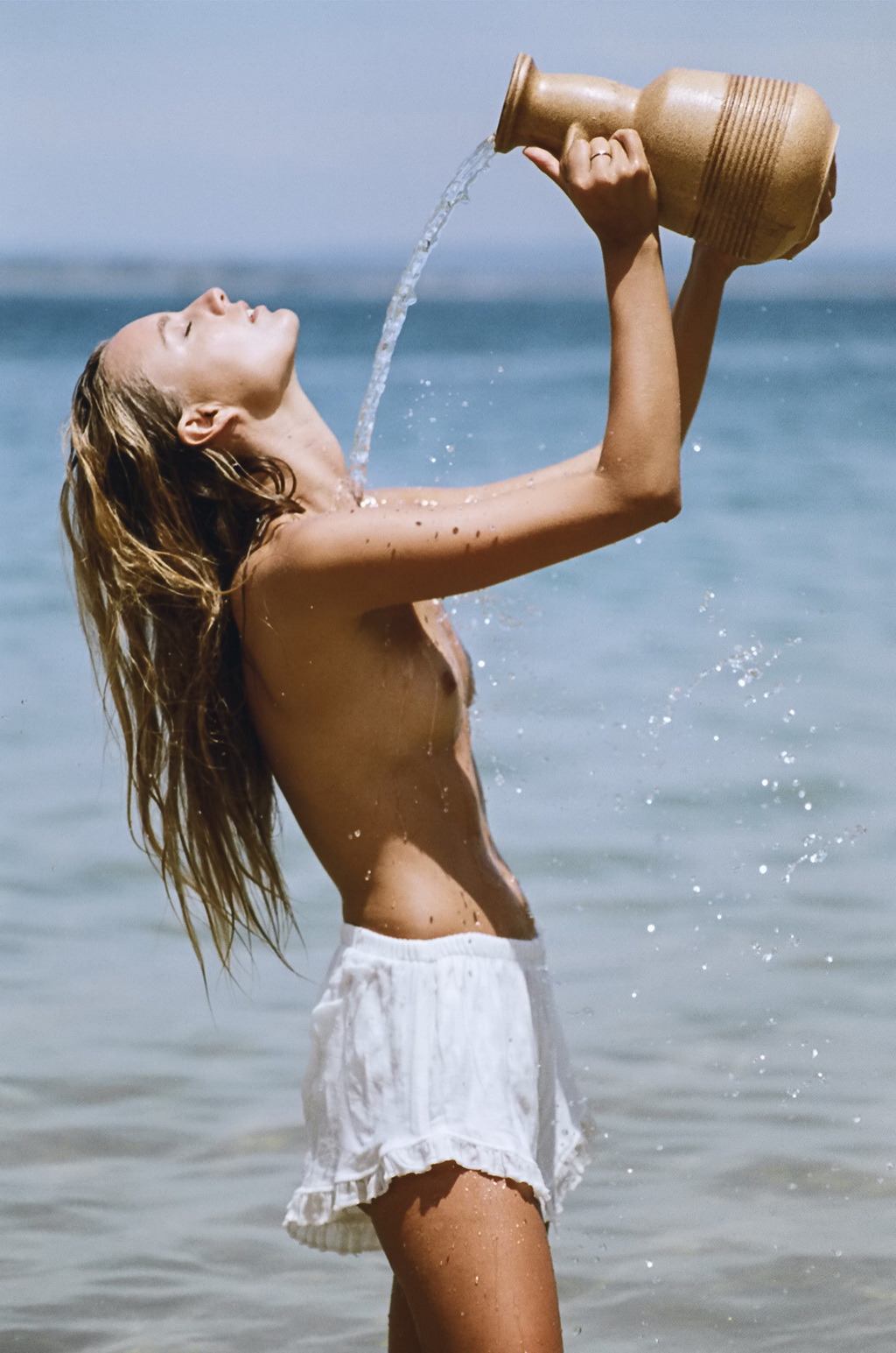 Celeb hottie & model Maya Stepper topless at the beach