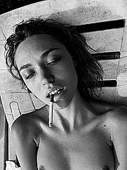 Cora Keegan smoking cigarette topless boobs exposed