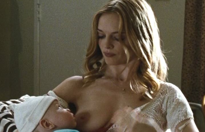 Heather Graham has her tit and nipple nude in the hangover movie