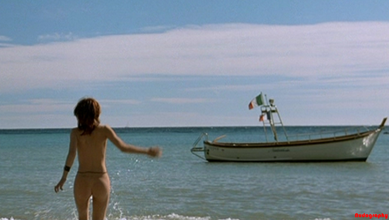Julie Gayet (Lovely Rita) naked at the beach