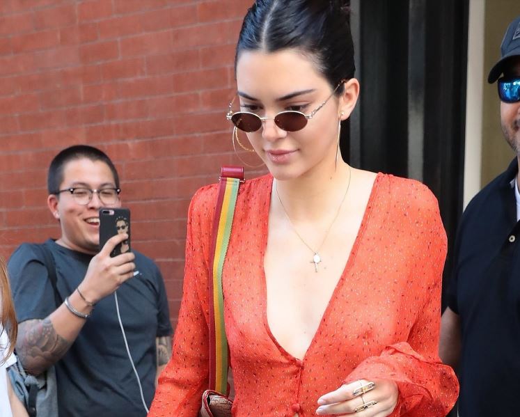 Kendall Jenner see through top in public. Tits and nipples.