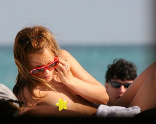Mena Suvari -  topless paparazzi photos - naked on the beach