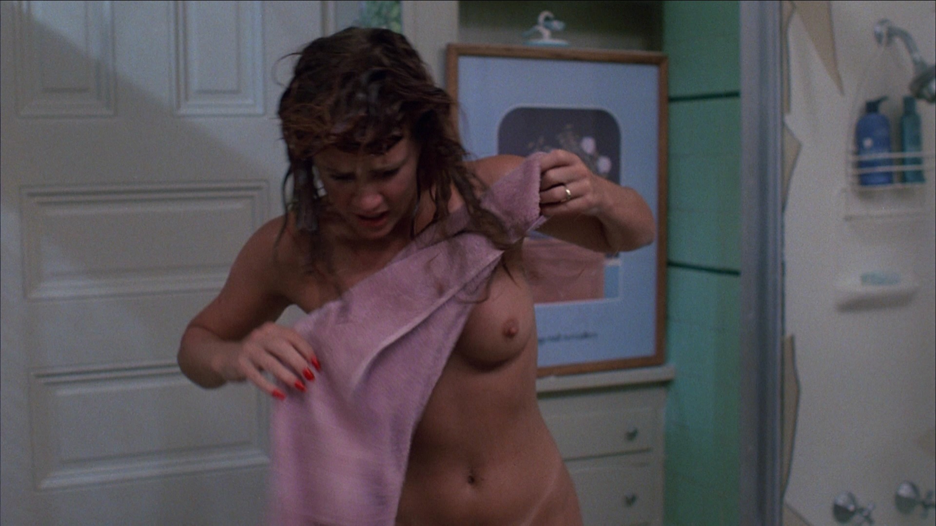 Tawny Kitaen #stripping topless in the bathroom. 