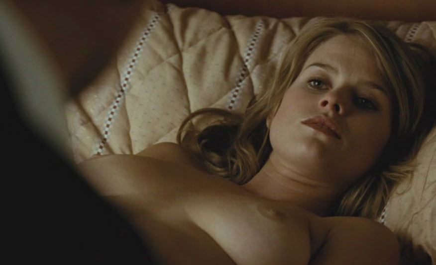 The delicious busty blonde celeb Alice Eve having her big boobs topless in bed. Famous juggs!