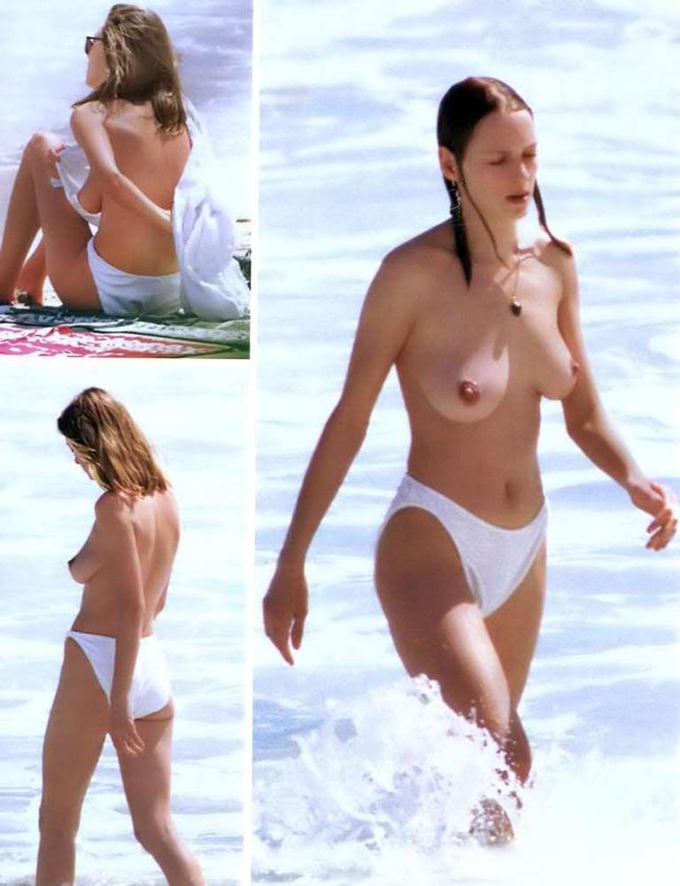 Uma Thurman nude and topless on beach - papparazzi photo