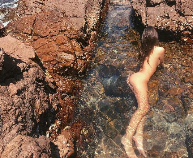 Emily Ratajkowski posted a sweet photo online while swimming nude