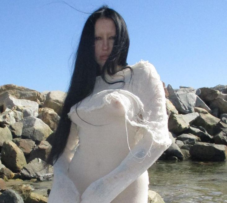 Noah Cyrus' famous, puffy tits, and nipples exposed in sheer dress (at the beach)