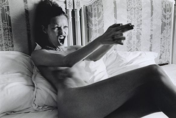 Rie Rasmussen - model - nude -bw naked on bed